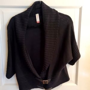Women's sweater with buckles